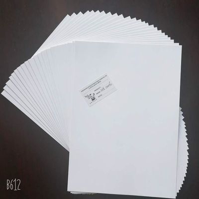 Карточка искусства NINGBO FOLD C2S изготовлена из деревянной целлюлозы с каолинитовым покрытием для высокого блеска